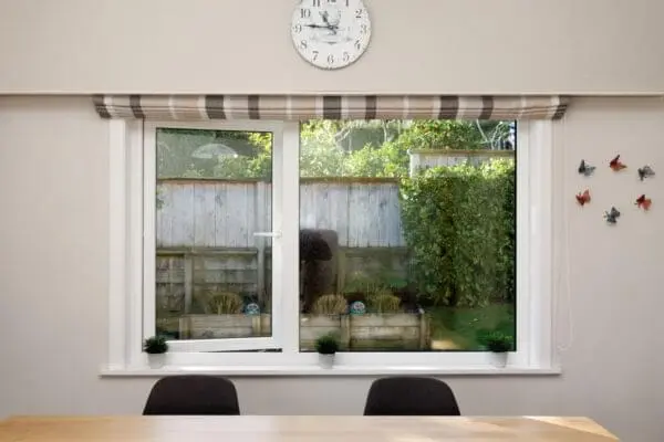 View of white casement window and dining table