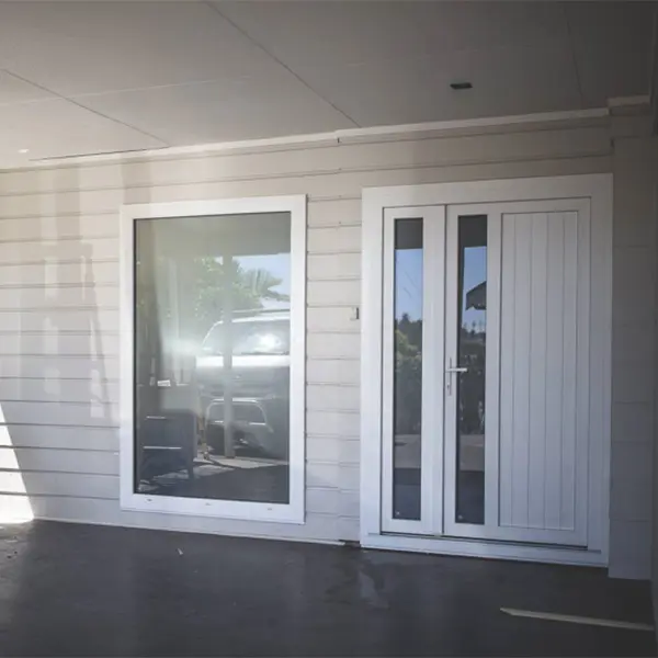 White entrance door on villa